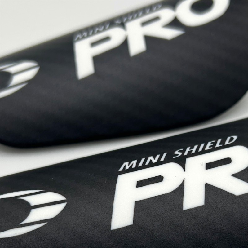 Mini Protège-tibias Noires